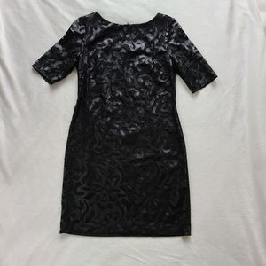 Evening dress with faux leather on mesh overlay